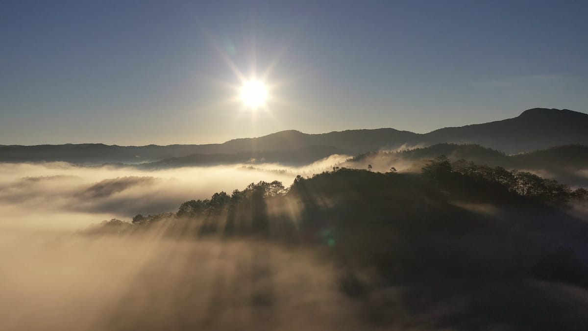 First light: nineteen seconds above the fog